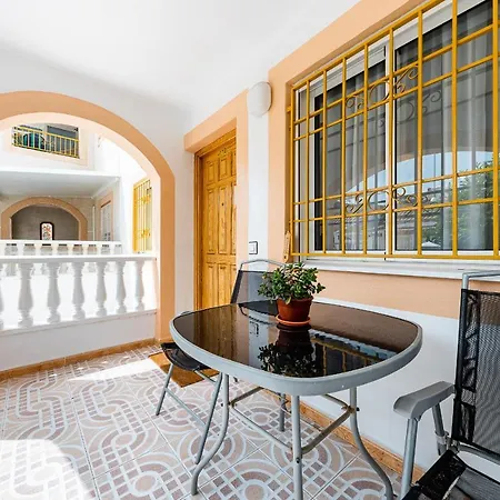 Апартаменты Apartamento Con Piscina Los Altos Торевьиа